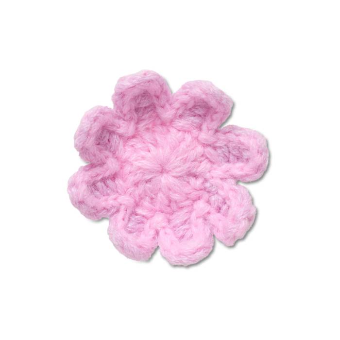 Flor rosa claro de ganchillo