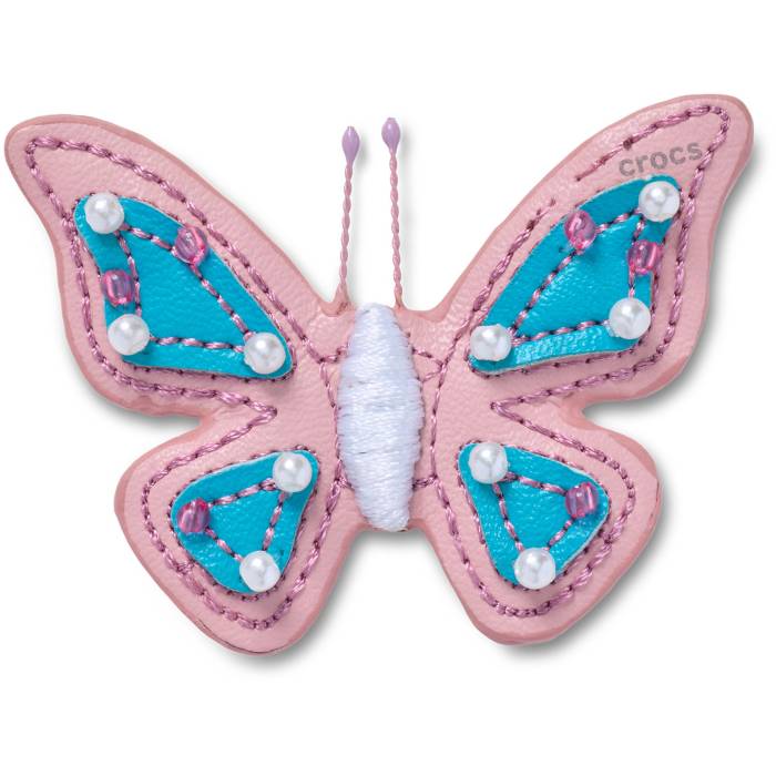 Mariposa rosa de cuero sintético