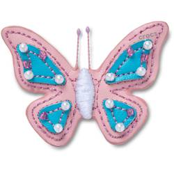 Mariposa rosa de cuero sintético